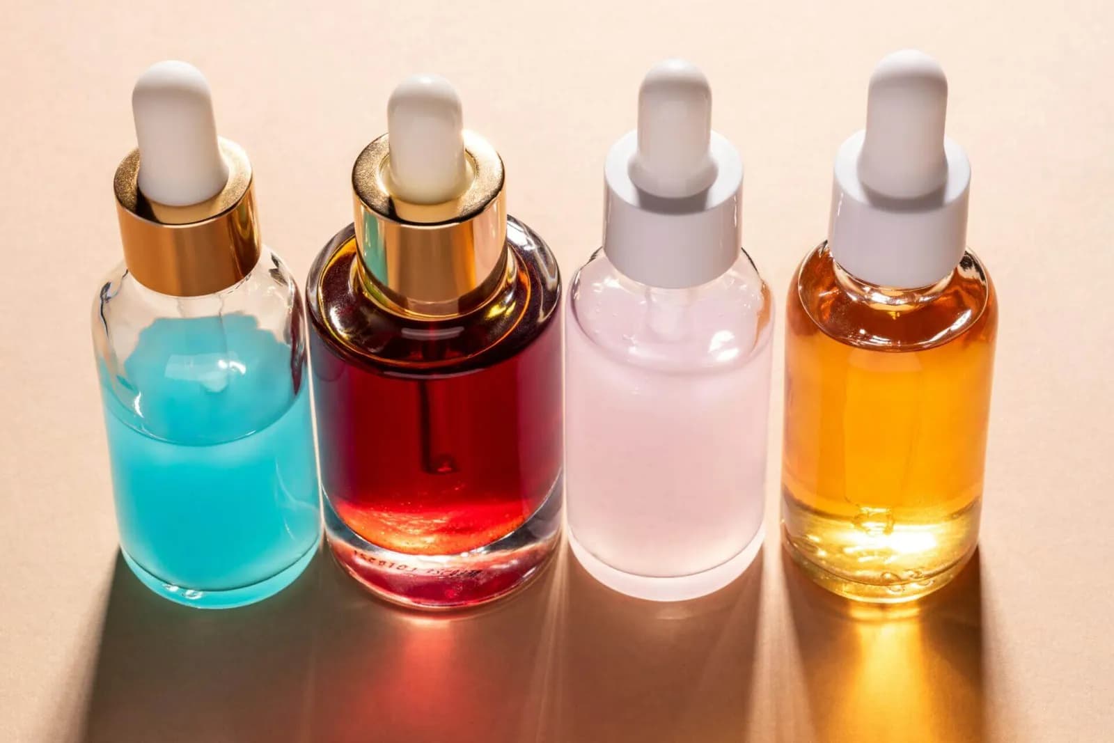 Row of serum bottles in warm light