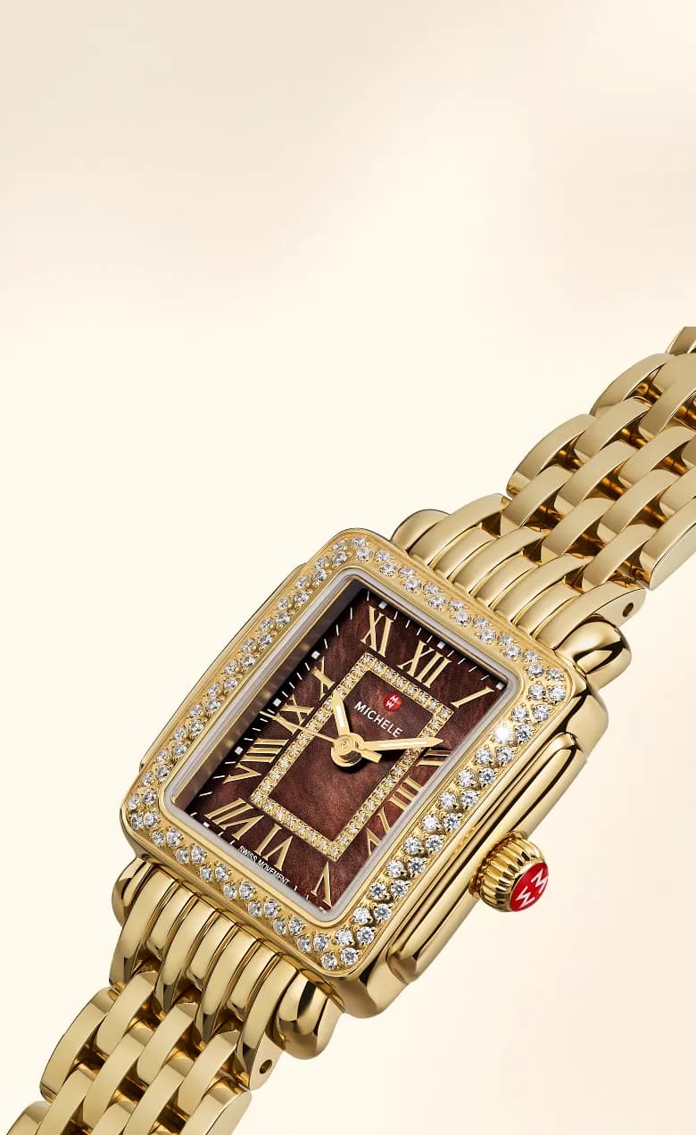 Gold watch with diamond bezel